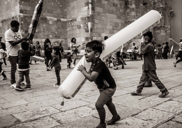Boy Running with Baloon, Oaxaca Cathedral